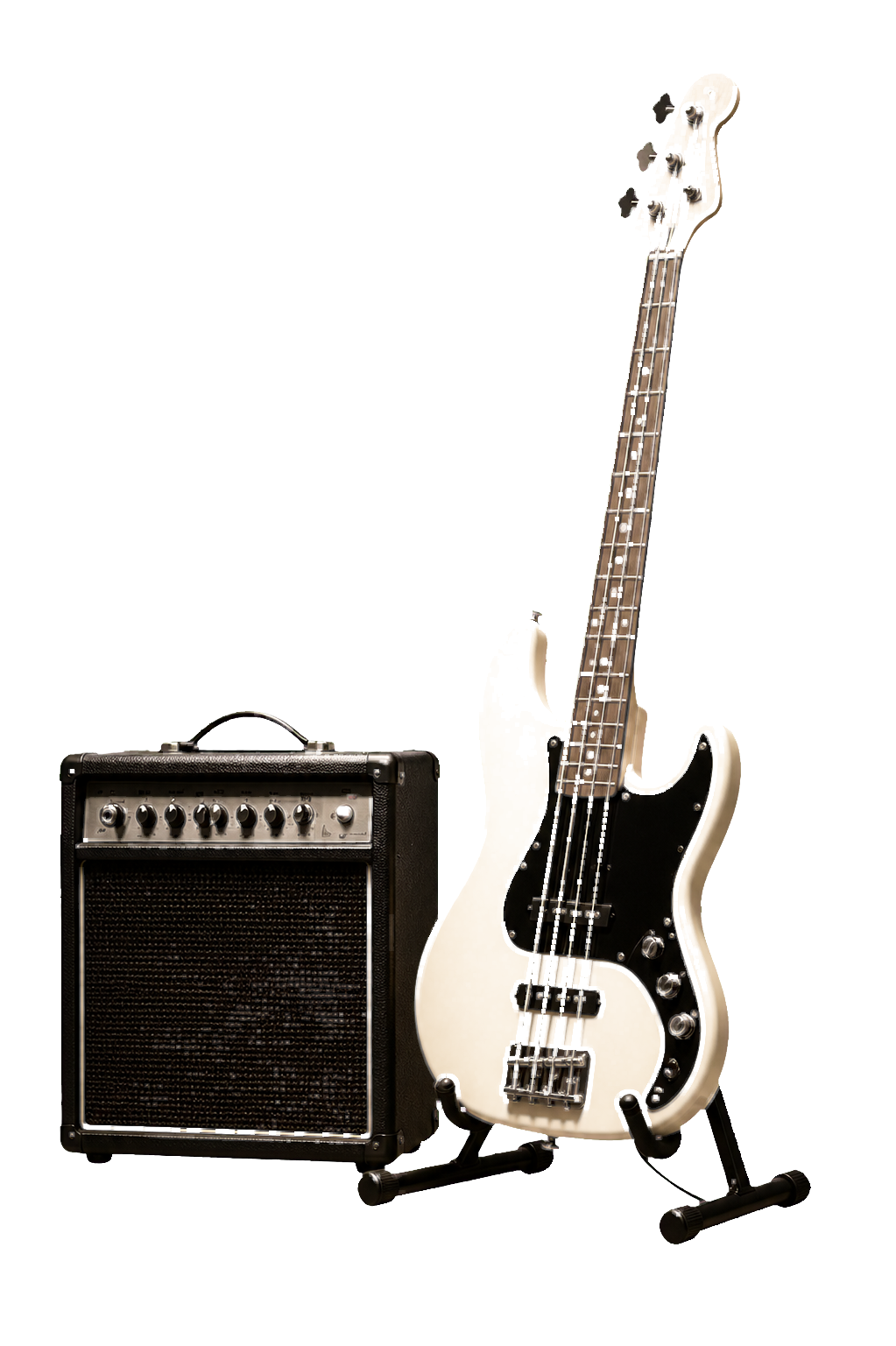 A bass guitar resting on a stand next to a combo amplifier at the edge of a dark stage.